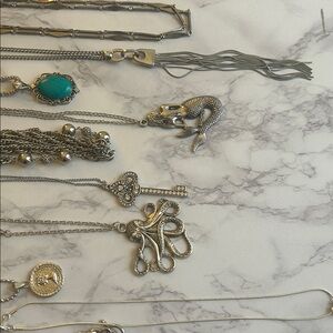 Lot of 16 silver tone fashion necklaces